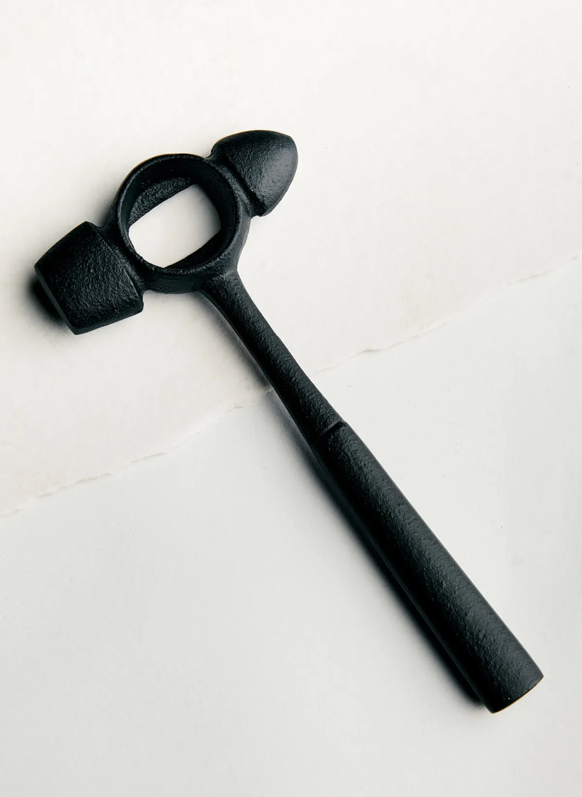 Women Imogene + Willie cast iron hammer bottle opener