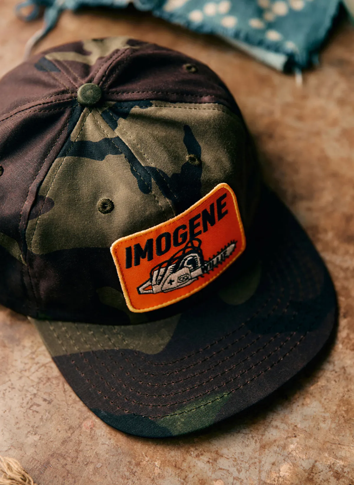 Women Imogene + Willie the camo "chainsaw" cap