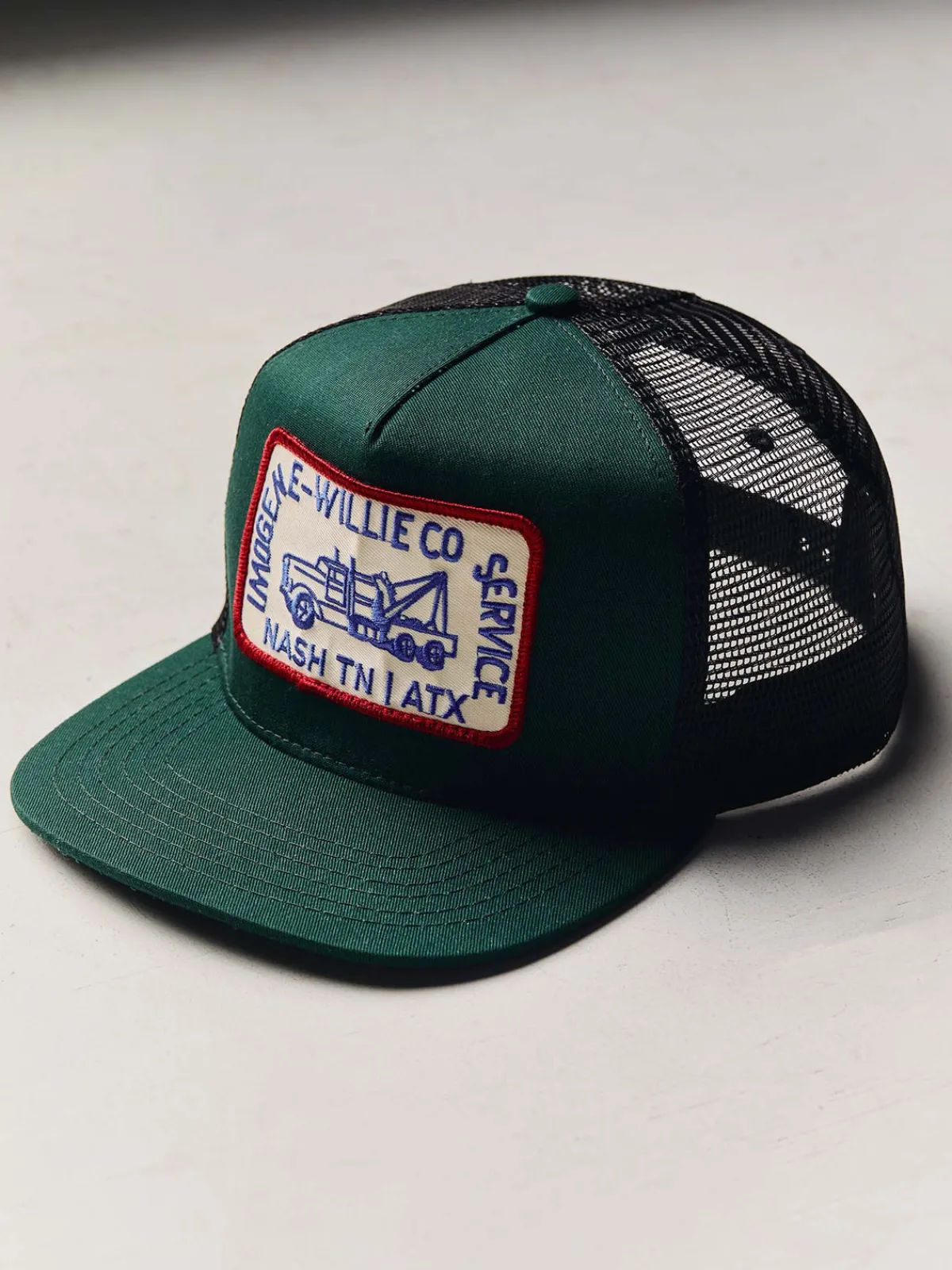Women Imogene + Willie the "tow service" trucker